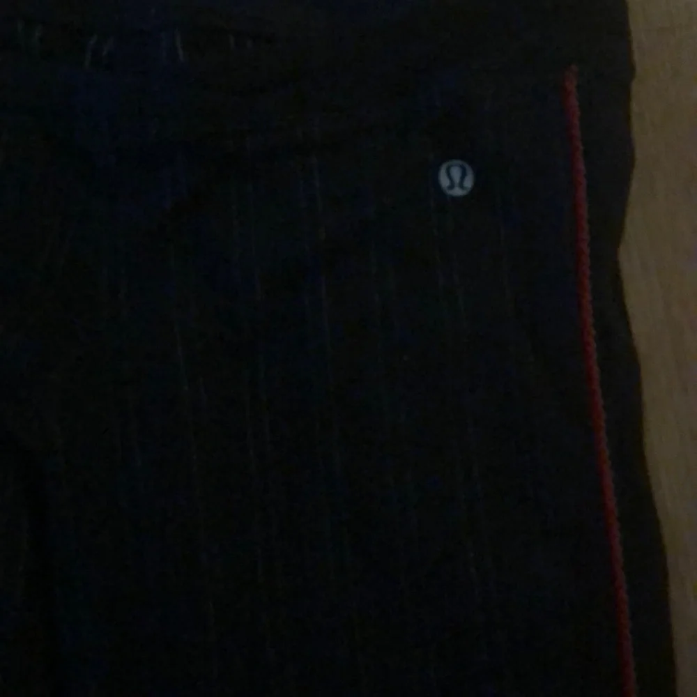 Black and white Lululemon pants.​